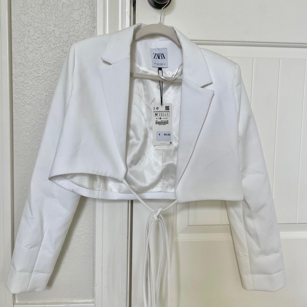 Brand new Zara blazer with tags. Size: medium. Color: White